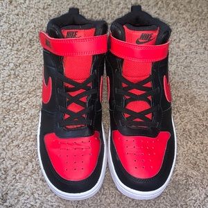 Like new Black and Red High Top Nike
